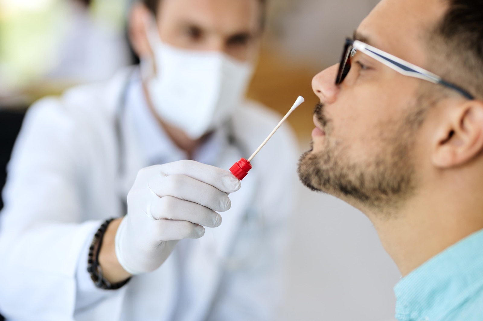 A COVID-19 PCR nasal swab test at Atlanta Urgent Care